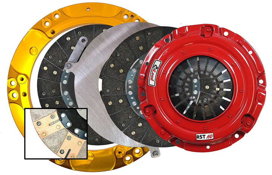Layout of high-performance clutch components, featuring a red pressure plate and a gold flywheel ring.