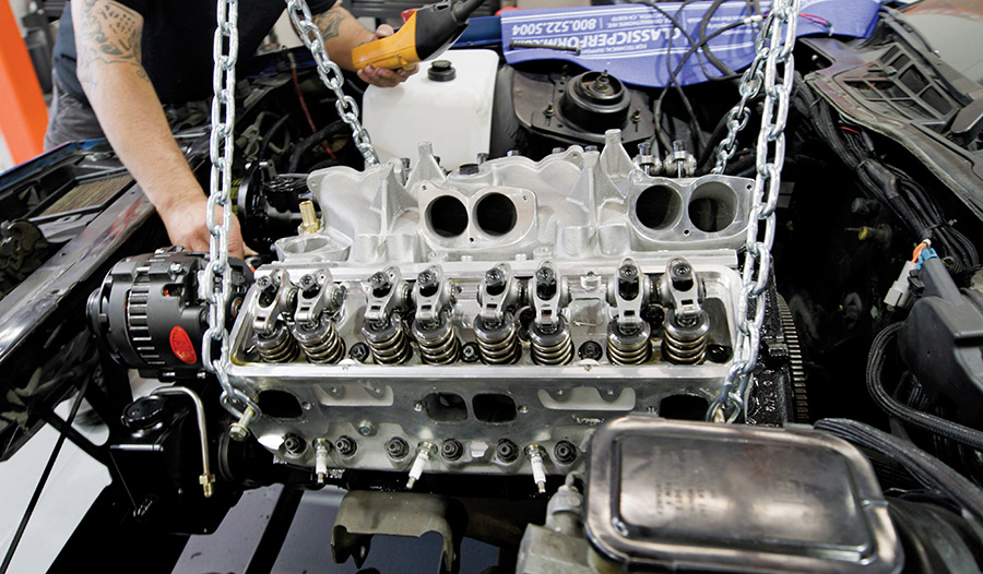Engine block seated in the Camaro chassis.