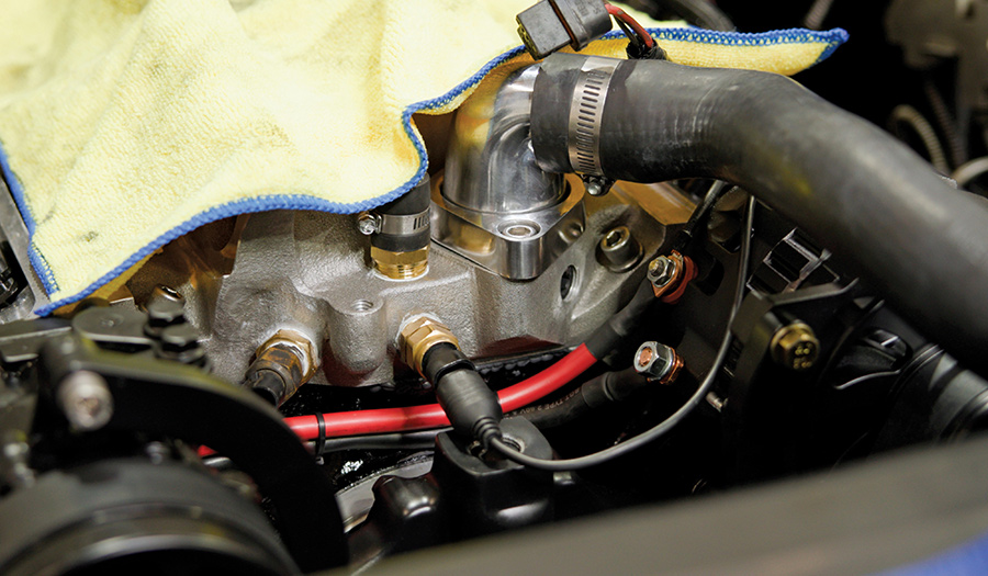 Connecting engine sensors and electrical lines.