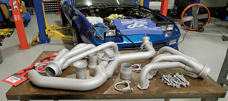 Mid-length headers with silver Cerakote coating.
