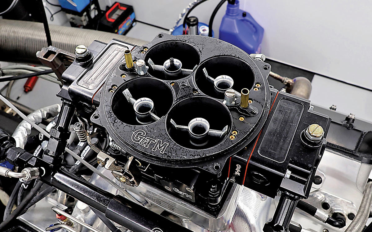 Top view of a dominator-sized four-barrel carburetor from Get’M Performance.