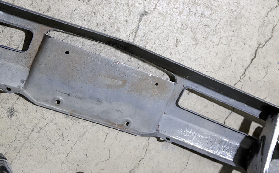 Original license plate recess on bumper rear.