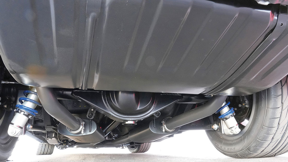 Camaro undercarriage showing rear differential and dual exhaust.