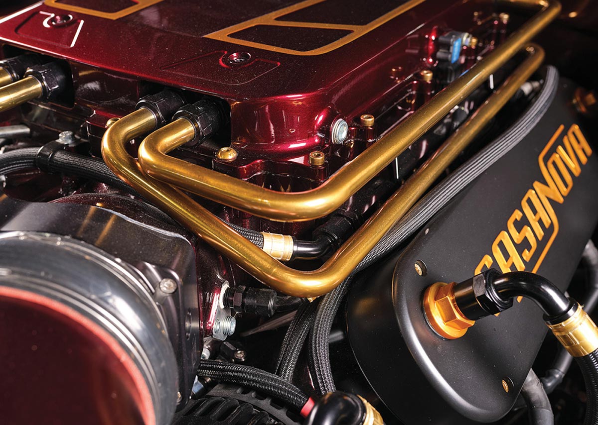 Close-up of supercharger and custom valve covers.