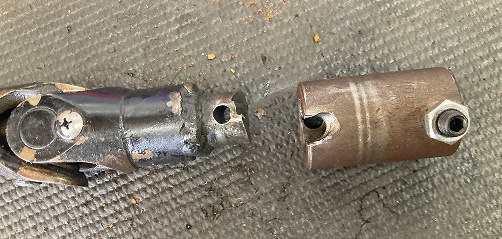 Steering coupler separated from the column shaft.