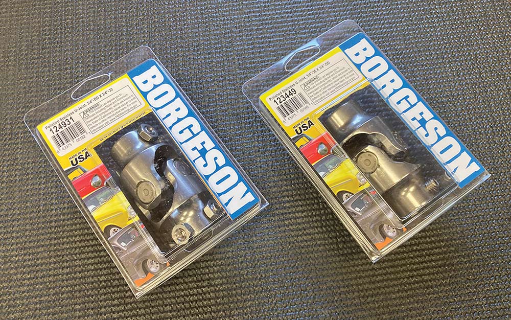 Two Borgeson polished stainless steel universal joints.