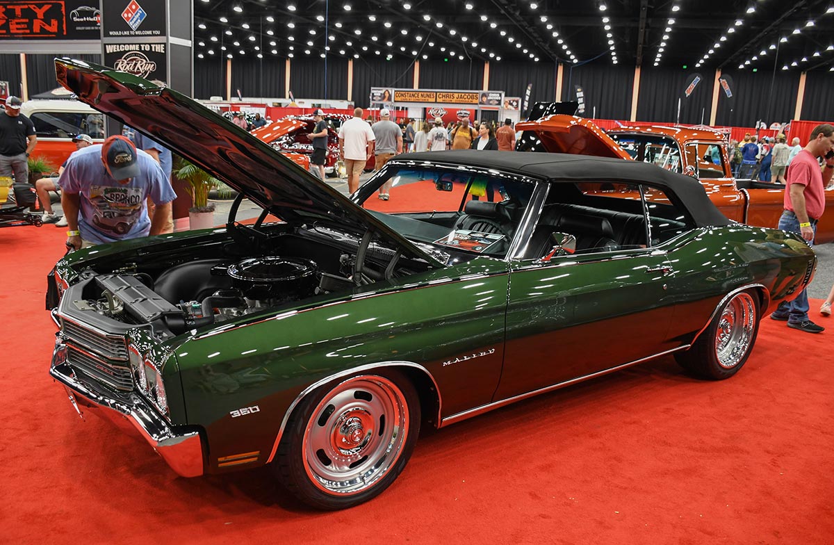 Dark green 1970 Chevelle Malibu convertible with hood open