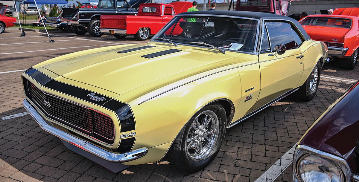 Yellow first-generation Camaro SS with black stripes