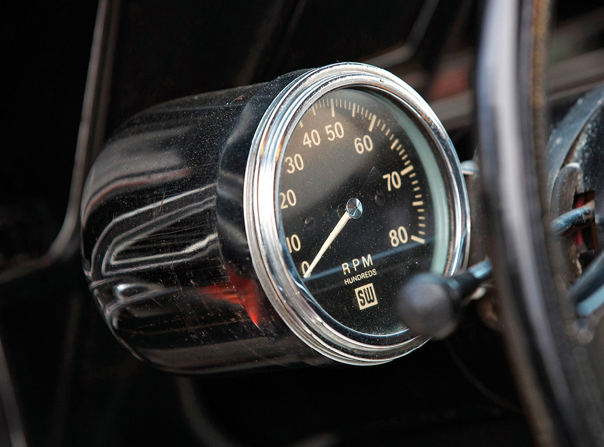 Column-mounted Stewart-Warner tachometer and steering wheel