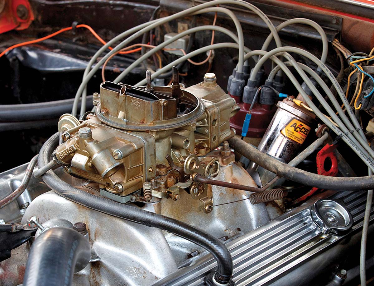 Holley four-barrel carburetor and Accel ignition components