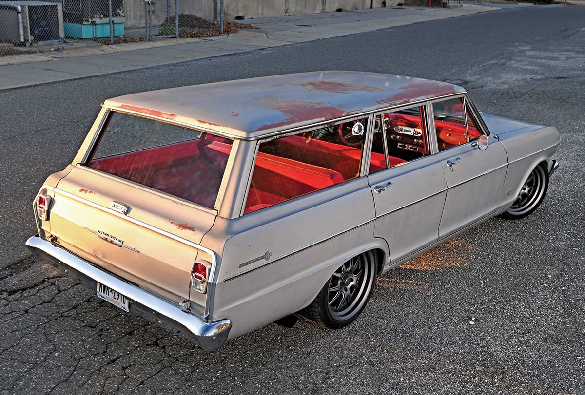 High-angle rear view of the Nova wagon on an asphalt lot.