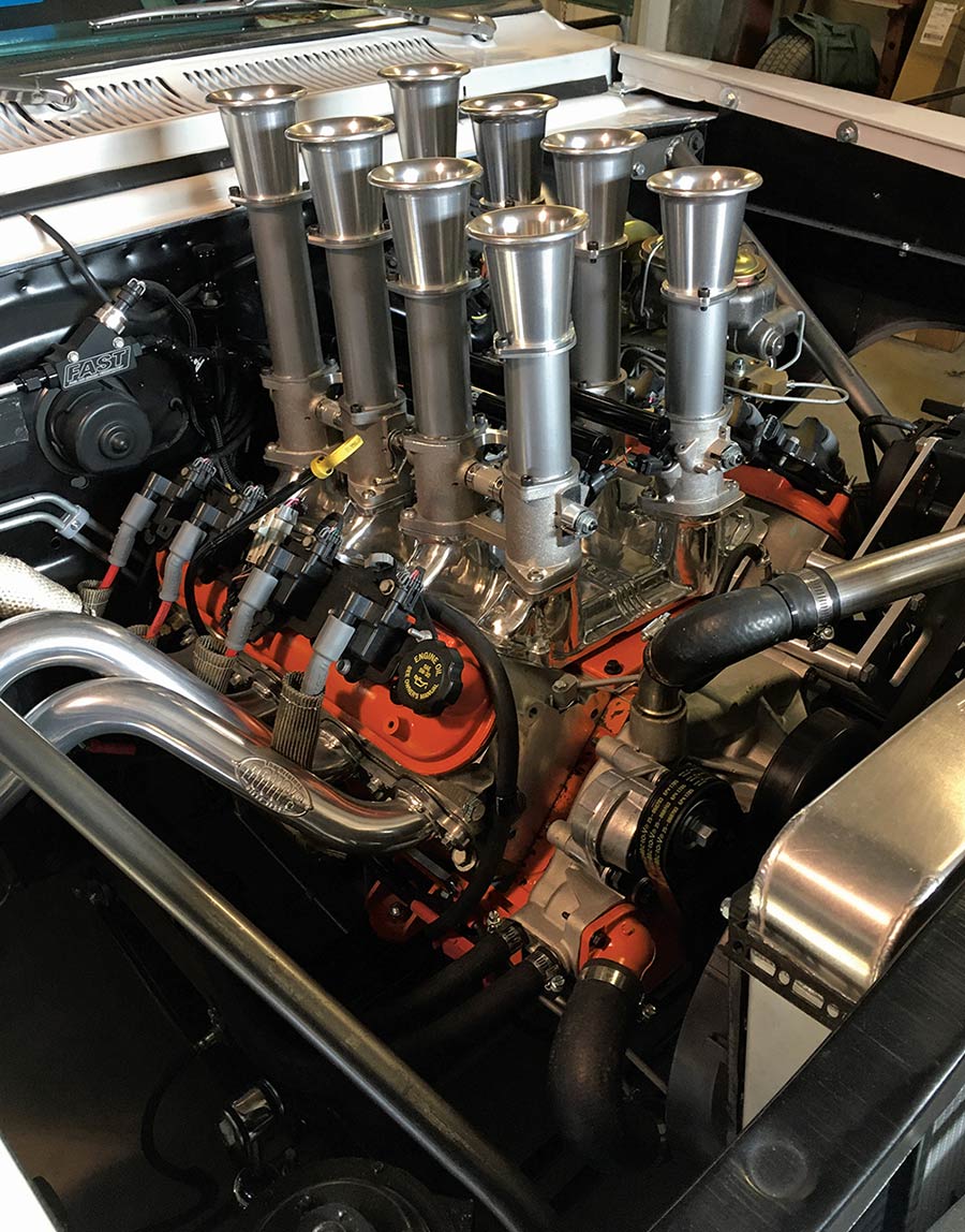 Eight individual intake stacks on top of the engine.