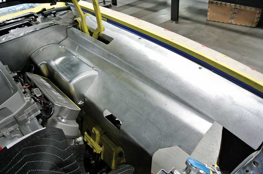 Custom machined cover concealing the brake components.