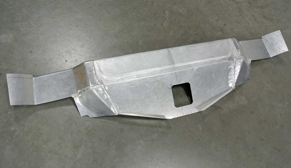 Radiator cover assembly with additional sections on floor.