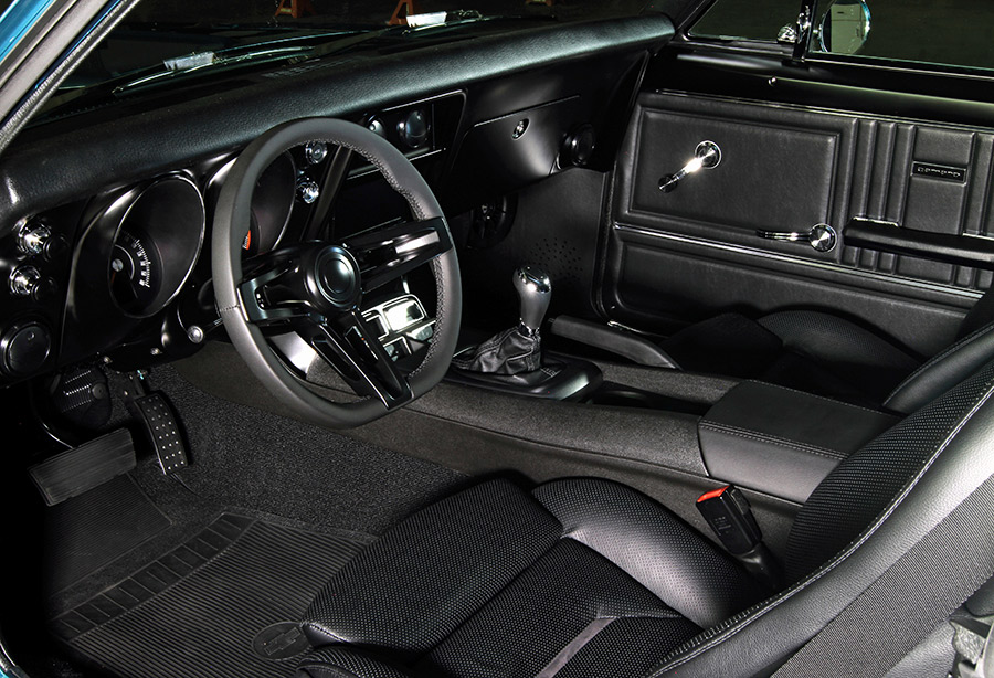 Custom black interior of the 1967 Camaro.