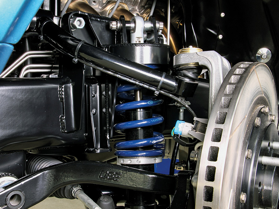Front suspension assembly with blue coilover spring.