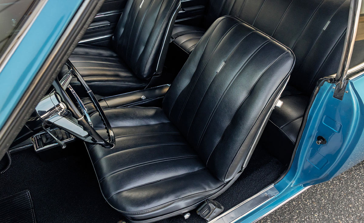 Detailed view of the black OEM upholstery bucket seats.