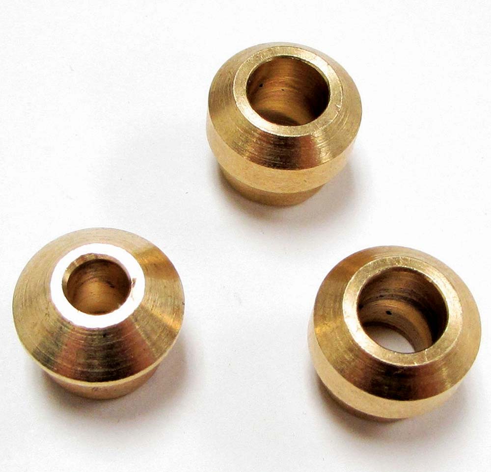Trio of brass conversion fittings for adapting steering box hose connections.