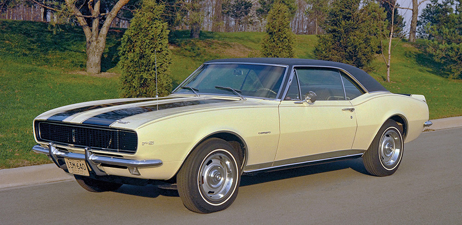 Yellow 1967 Chevrolet Camaro Z28 parked on pavement.
