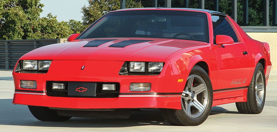 Front view of a red 1985 IROC-Z Camaro.