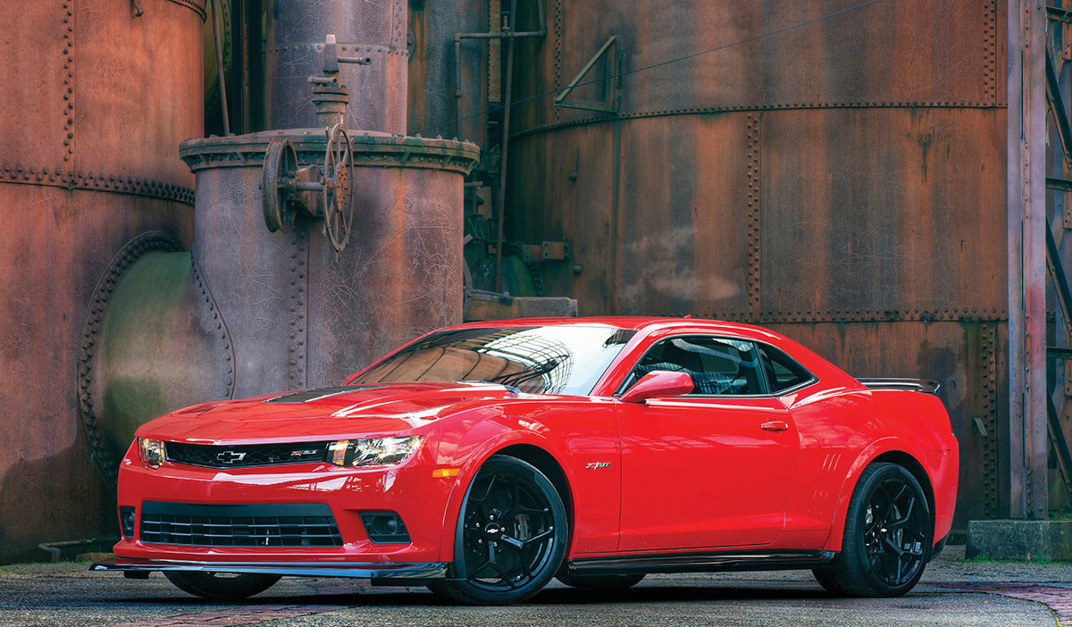 Red fifth-generation Z28 profile in an industrial setting.