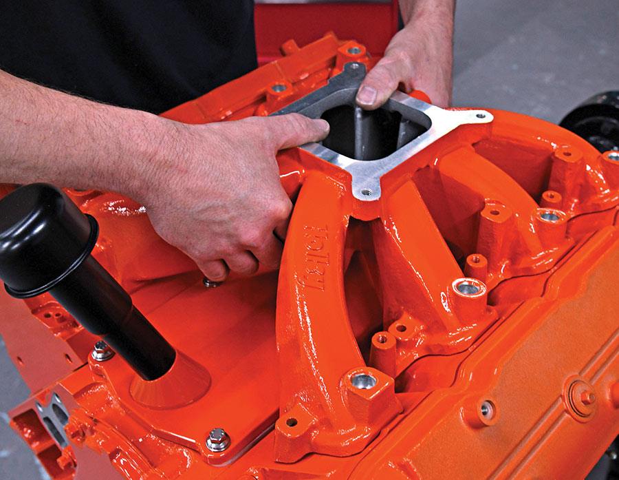 Placing the Holley single-plane EFI intake on the engine.