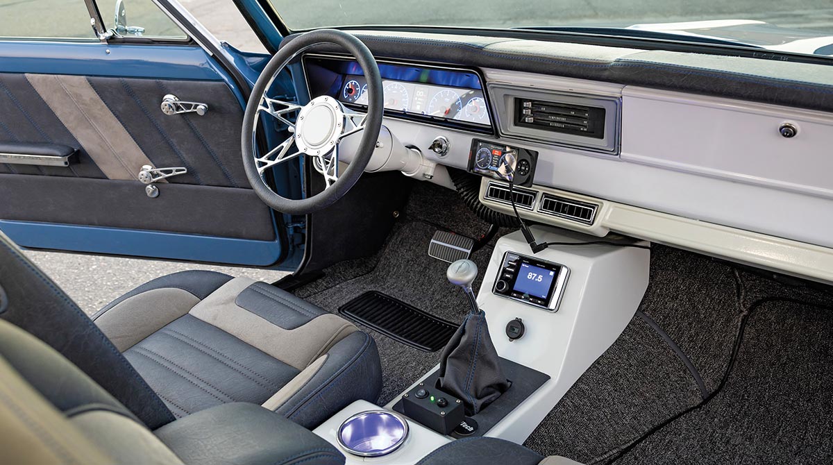 Custom interior featuring gray and black TMI seats.