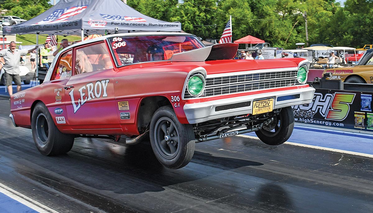 Red Chevy II "Leroy" gasser launching.