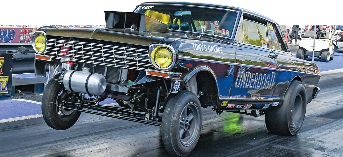 Black Chevy gasser "Underdog II" with yellow headlights.