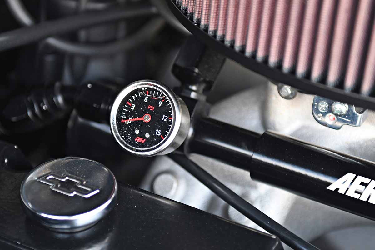 Close-up of fuel pressure gauge mounted on an Aeromotive fuel rail.
