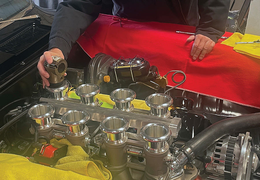 Airflow meter positioned on a throttle body intake.