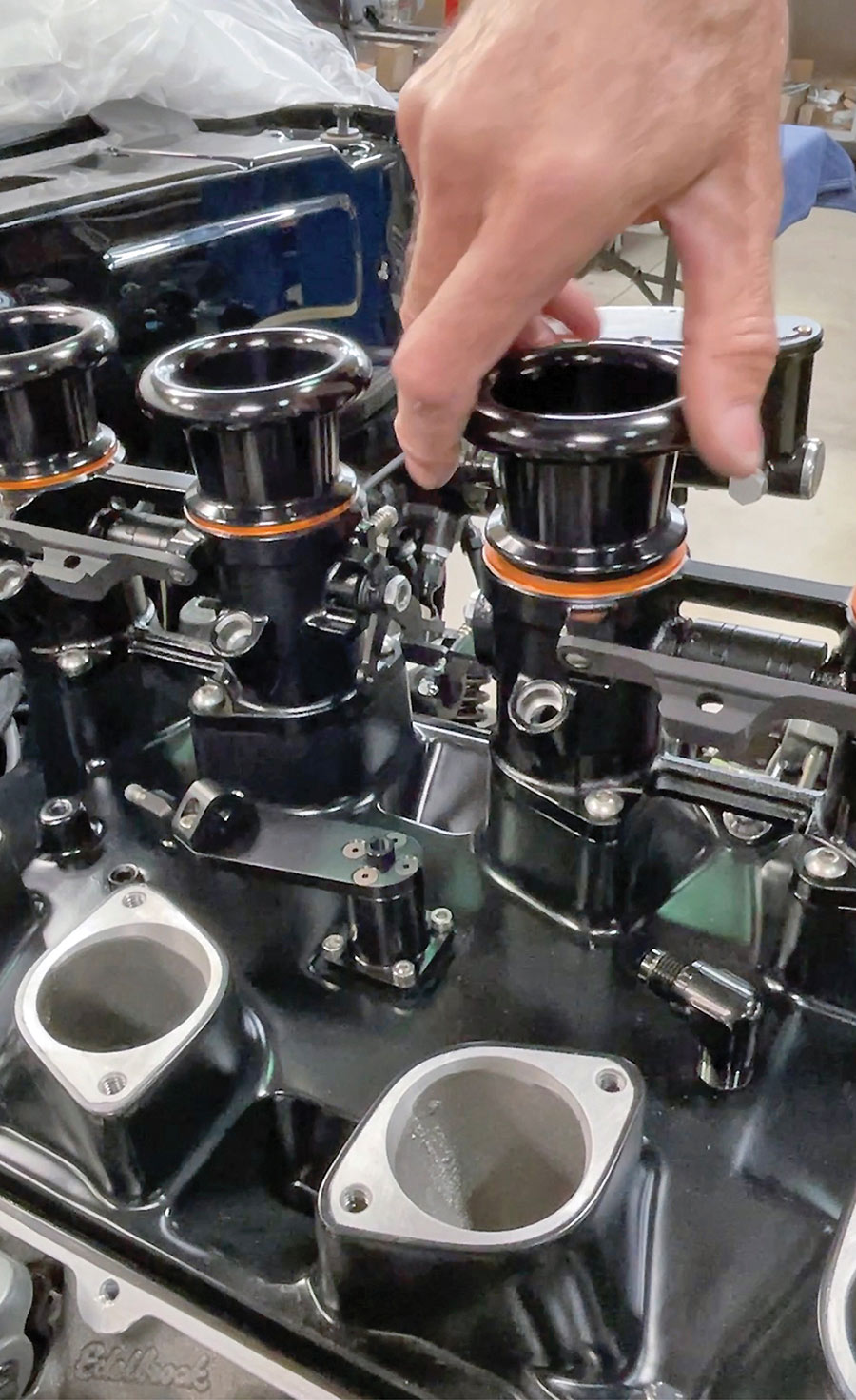 Orange anodized spacer rings installed beneath the airhorns.