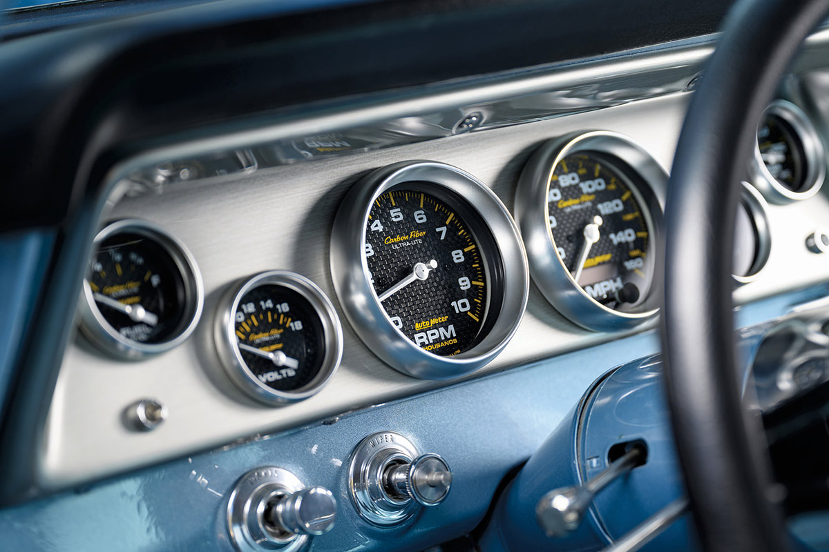 Close-up of the Auto Meter Carbon Fiber instrument cluster.