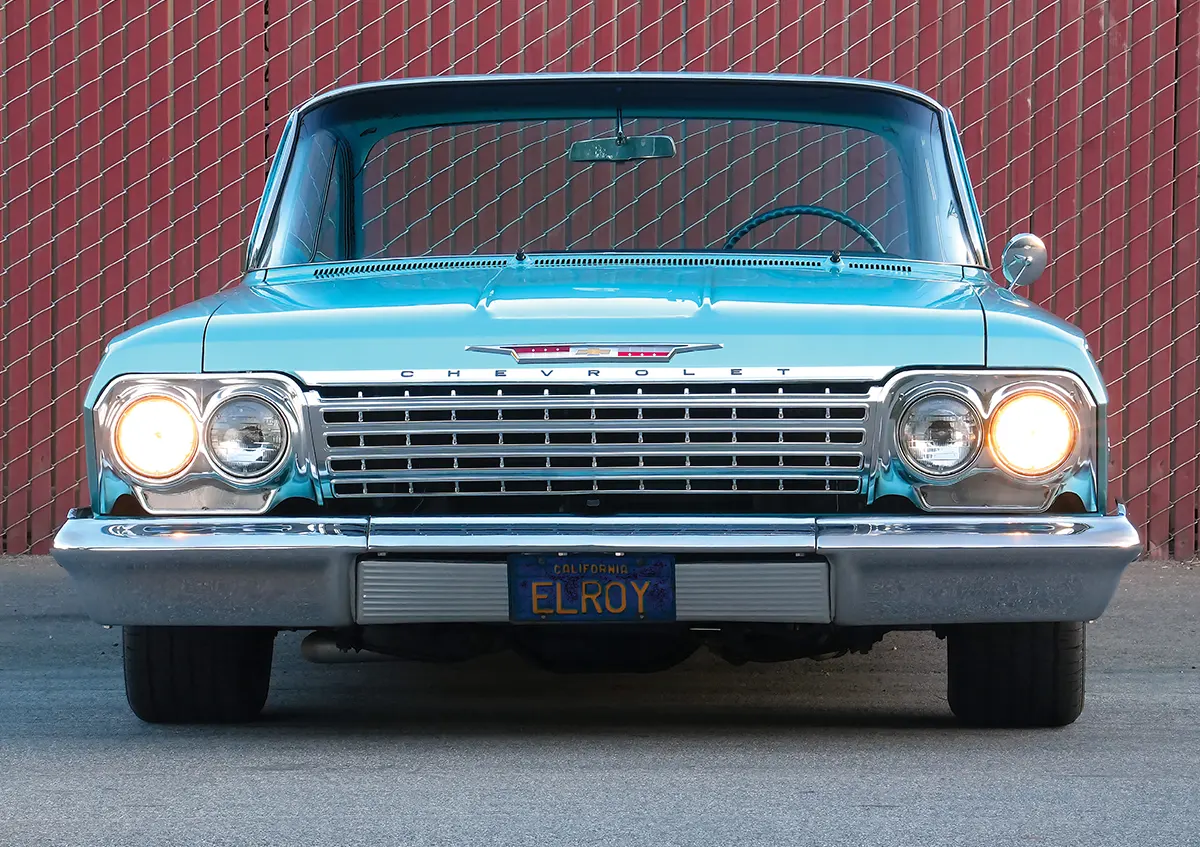 Head-on view of the 1962 Chevy chrome grille and headlights.
