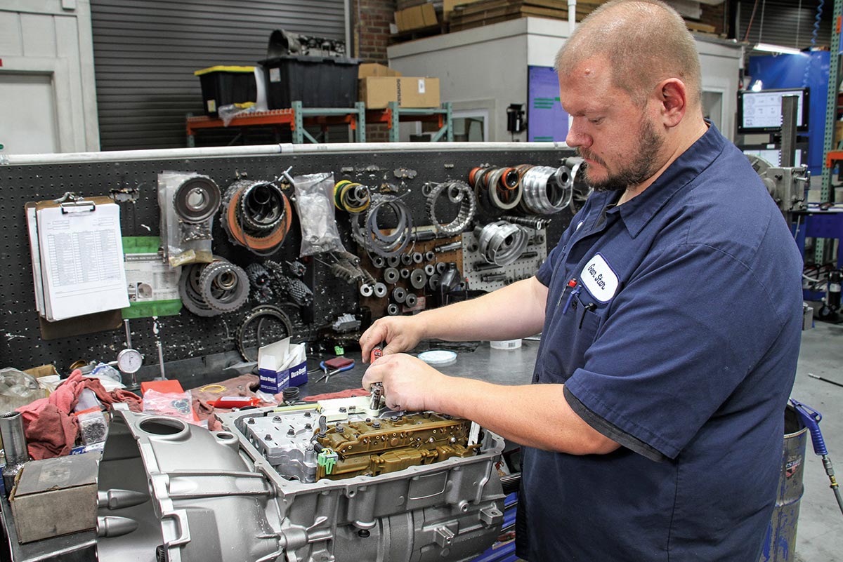 Reinstalling the upgraded valvebody assembly.