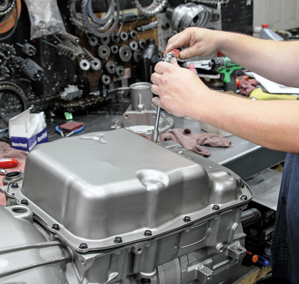 Final installation of the oil pan.