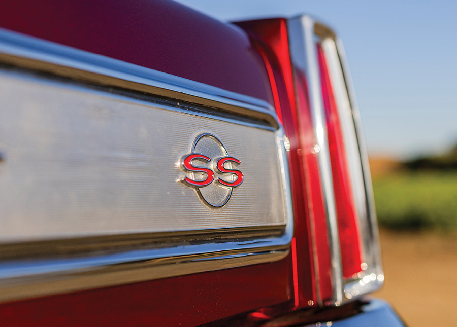 Detailed close-up of the chrome SS trunk emblem.