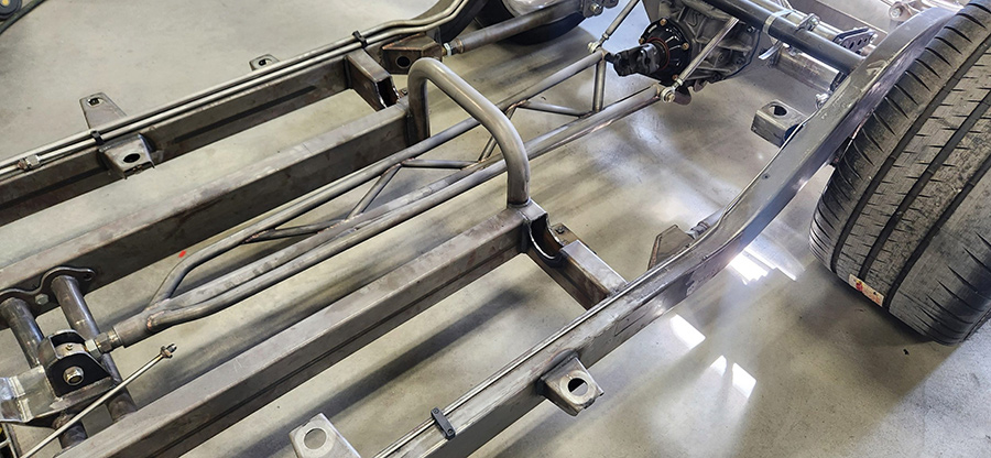 Fabricated rearend housing and trussed torque arm.