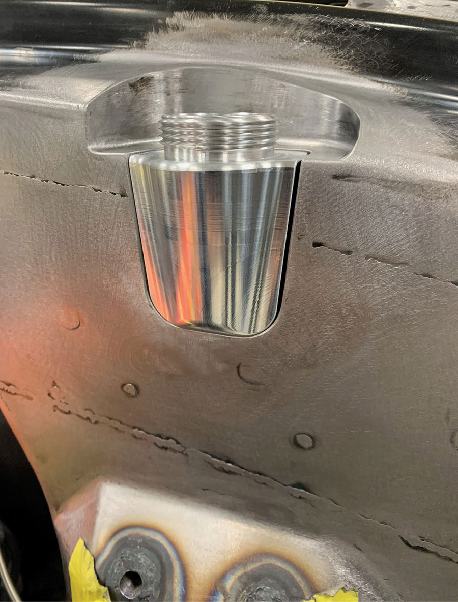 CNC machined billet aluminum master cylinder reservoir.